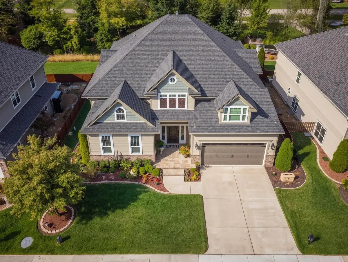 Realistic drone-style photography, crisp daylight, natural colors, balanced composition emphasizing craftsmanship, safety, and curb appeal.